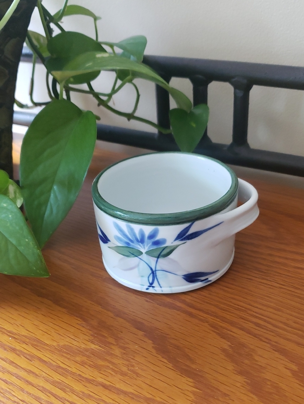 Hand-Painted Blue Floral Ceramic Dish with Green Rim